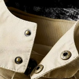 Elegantiškas paltas su keliais kišenėmis