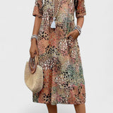 Colette - Vibracijos midi suknelė