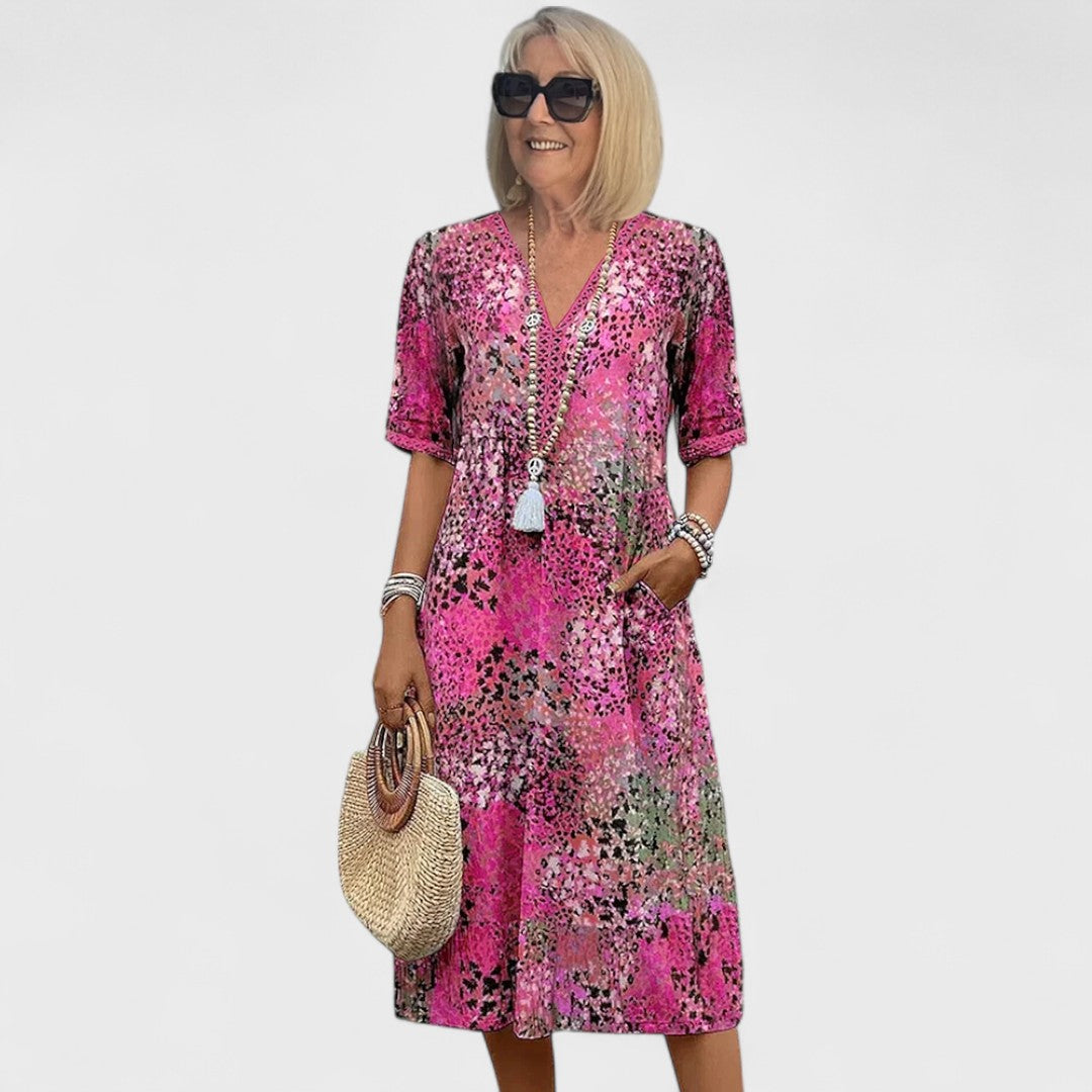 Colette - Vibracijos midi suknelė